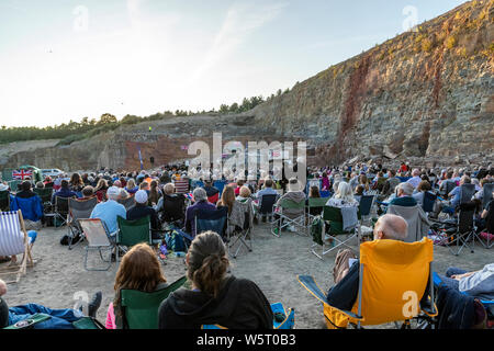 Lydbrook Brass Band play a 'Proms in the Quarry' at Barnhill Quarry, Forest of Dean, Gloucestershire. Event includes flypast to 'The Dambusters' Stock Photo