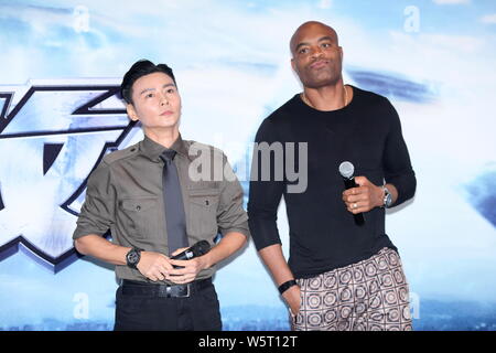 Former UFC Middleweight Champion Anderson Silva, right, and Chinese actor Zhang Jin attend a press conference for new movie 'The Invincible Dragon' in Stock Photo