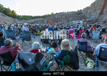 Lydbrook Brass Band play a 'Proms in the Quarry' at Barnhill Quarry, Forest of Dean, Gloucestershire. Event includes flypast to 'The Dambusters' Stock Photo