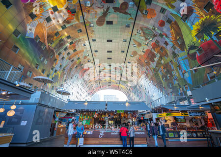 Rotterdam, Netherlands - May 13, 2019: The Markthal is a residential and office building with a market hall underneath, located in Rotterdam, Netherla Stock Photo