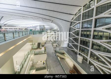 The Beijing Daxing International Airport is illuminated by light projections at night in Beijing, China, 27 June 2019. Beijing Daxing International Ai Stock Photo