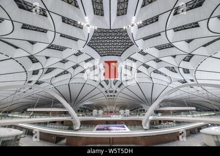 The Beijing Daxing International Airport is illuminated by light projections at night in Beijing, China, 27 June 2019. Beijing Daxing International Ai Stock Photo