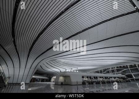 The Beijing Daxing International Airport is illuminated by light projections at night in Beijing, China, 27 June 2019. Beijing Daxing International Ai Stock Photo