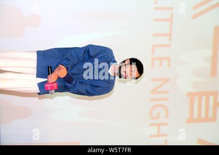 Japanese film director Rikiya Imaizumi, center, attends a press conference for new movie 'Little Nights, Little Love' during the 22nd Shanghai Interna Stock Photo