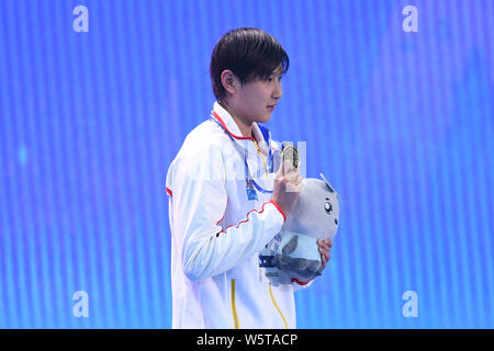 China's Wang Jianjiahe poses with her gold medal on the podium after winning the women's 800m Freestyle final at the FINA World Swimming Championships Stock Photo