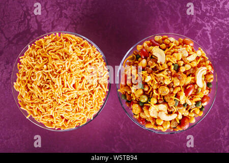 High angle view of assorted namkeen in bowls Stock Photo