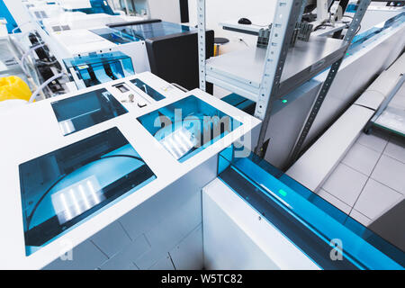 Blood samples move on the tray of pre-analytical system. Clinical laboratory and blood bank, fully automated equipment Stock Photo