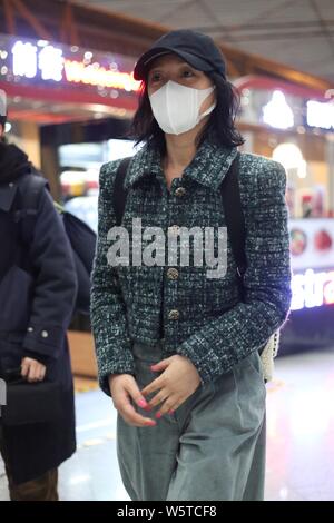 Chinese actress Zhou Xun arrives at the Beijing Capital International ...