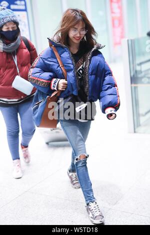 Taiwanese singer Jolin Tsai is pictured at the Beijing Capital International Airport in Beijing, China, 24 December 2018. Stock Photo