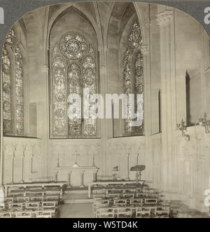 St. Martin's Chapel, Cathedral of St. John the Divine, New York, in 1920s. The Cathedral of Saint John the Divine is the cathedral of the Episcopal Diocese of New York. It is located in New York City at 1047 Amsterdam Avenue between West 110th Street and 113th Street in Manhattan's Morningside Heights neighborhood. Designed in 1888 and begun in 1892, the cathedral has undergone radical stylistic changes and interruption of construction by the two World Wars. Stock Photo