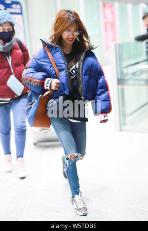 Taiwanese singer Jolin Tsai is pictured at the Beijing Capital International Airport in Beijing, China, 24 December 2018. Stock Photo