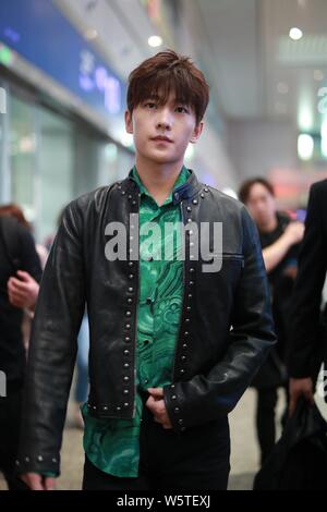 --FILE--Chinese actor Yang Yang arrives at the Shanghai Hongqiao Railway Station in Shanghai, China, September 25, 2017. Stock Photo