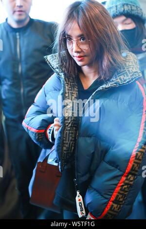 Taiwanese singer Jolin Tsai is pictured at the Beijing Capital International Airport in Beijing, China, 24 December 2018. Stock Photo