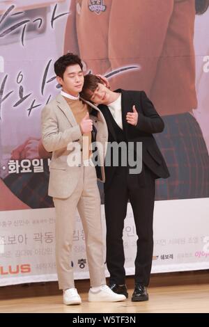 South Korean actors Kim Dong-young, left, and Yoo Seung-ho attend a press conference for new TV series 'My Strange Hero' in Seoul, South Korea, 7 Dece Stock Photo