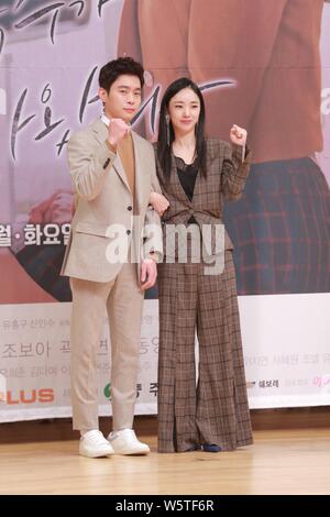 South Korean actors Kim Dong-young, left, and actress Park Ah-in attend a press conference for new TV series 'My Strange Hero' in Seoul, South Korea, Stock Photo