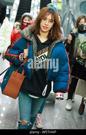 Taiwanese singer Jolin Tsai is pictured at the Beijing Capital International Airport in Beijing, China, 24 December 2018. Stock Photo