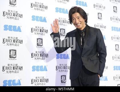 **TAIWAN OUT**Japanese actor and singer Takuya Kimura attends a promotional event for the video game 'Judge Eyes' in Taipei, Taiwan, 2 December 2018. Stock Photo