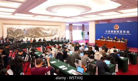 The press conference after 132 beauty salon frauds who used sugar as the main ingredient to make anti-cancer drugs captured is held in Beijing, China, Stock Photo