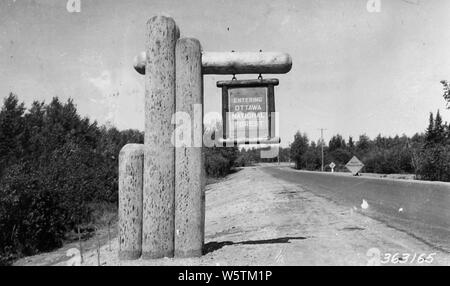 Photograph of Forest Entrance M-73 at State Line; Scope and content:  Original caption: Forest entrance M-73 at State Line. Stock Photo