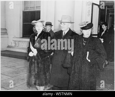 Photograph of Harry S. Truman, his wife Bess, and their daughter Margaret at the White House for the 1945 Inaugural ceremony, during which Truman was sworn in as Vice President. Stock Photo