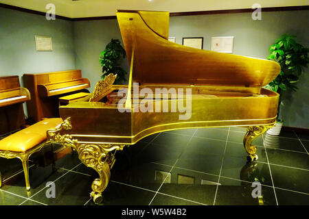 --FILE--A piano of Steinway & Sons, the US-German high-end piano maker, is displayed at the Wuhan Qintai Piano Museum in Wuhan city, central China's H Stock Photo