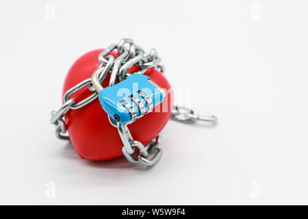 chain locked with password protection on red heart Stock Photo