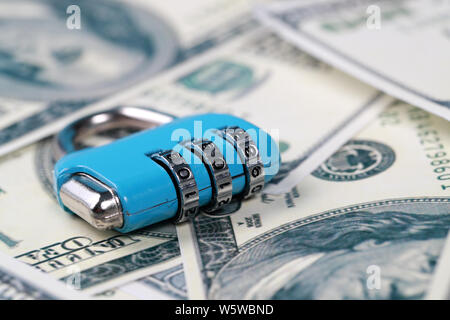 key lock with three digit on bank notes Stock Photo