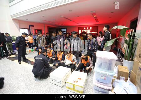 The press conference after 132 beauty salon frauds who used sugar as the main ingredient to make anti-cancer drugs captured is held in Beijing, China, Stock Photo