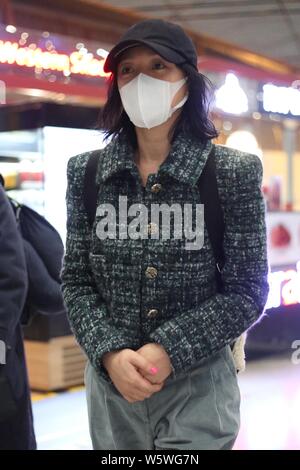 Chinese actress Zhou Xun arrives at the Beijing Capital International ...