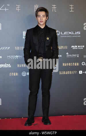 --FILE--Chinese actor Yang Yang arrives for the 14th Esquire Men At His Best (MAHB) Award 2017 in Beijing, China, November 22, 2017. Stock Photo