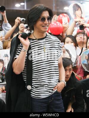 **TAIWAN OUT**Japanese actor and singer Takuya Kimura is pictured at the Taipei Songshan Airport in Taipei, Taiwan, 1 December 2018. Stock Photo