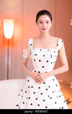 Chinese actress Wang Yuan Ke poses for portrait photos during an ...