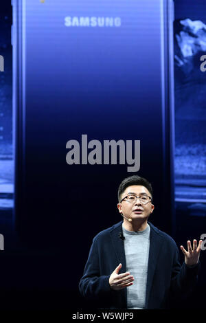 Shu Can, General Manager of Tech Operation Department of Samsung Electronics Greater China, introduces the Samsung Galaxy A8s smartphone during a laun Stock Photo