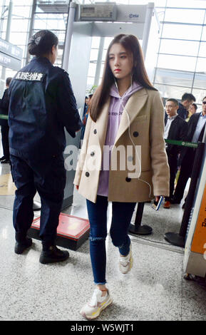 Chinese singer and actress Ju Jingyi is pictured at the Shanghai Hongqiao International Airport in Shanghai, China, 30 November 2018.