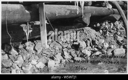 Photograph with caption Lake City breakwater, old crib. Stock Photo