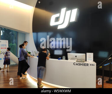 --FILE--People visit the flagship store of DJI in Shenzhen city, south China's Guangdong province, 8 September 2018.   Shenzhen in South China's Guang Stock Photo