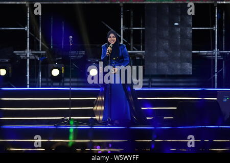 Malaysian singer-songwriter Shila Amzah poses as she arrives on