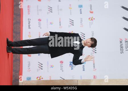 South Korean singer and actor Jung Jin-young, professionally known as Jinyoung, of South Korean boy group B1A4,  poses as he arrives on the red carpet Stock Photo