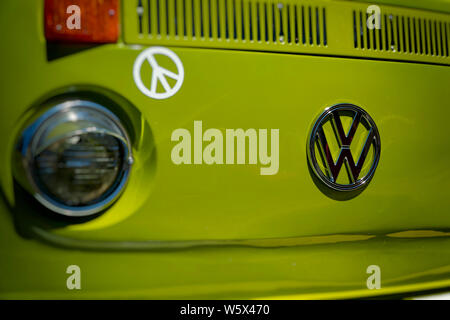 Retro Logo of Volkswagen Bus with peace sign Stock Photo