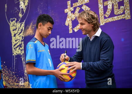 Czech retired footballer and CSL ambassador Pavel Nedved visits the Hainan Overseas Chinese Middle School in Haikou city, south China's Hainan provinc Stock Photo