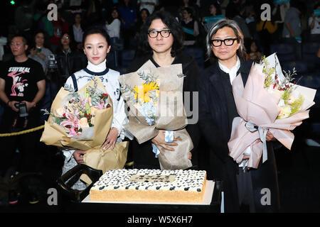 (From left) Chinese actress Zhou Xun, Japanese film director Shunji Iwai, and Hong Kong director Peter Chan, attend a press conference for new movie ' Stock Photo