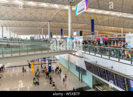 Check-in and Arrivals area at a terminal at Hong Kong International Airport, Chep Lak Kok, Hong Kong, China Stock Photo