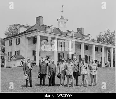 Prince Abdul Ilah of Iraq and representatives of the goverments of the United States and Iraq standing in front of George Washington's home at Mt. Vernon, Virginia. Stock Photo