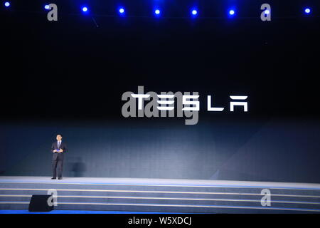 Tom Zhu Xiaotong, head of Tesla's Chinese operations, introduces Tesla virtual services during the World Leading Internet Scientific and Technological Stock Photo