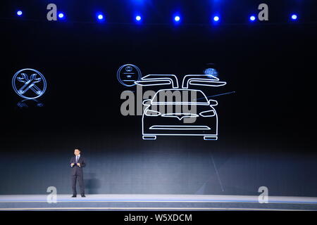 Tom Zhu Xiaotong, head of Tesla's Chinese operations, introduces Tesla virtual services during the World Leading Internet Scientific and Technological Stock Photo