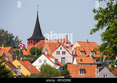 Svaneke Kirke and traditional red tiled houses, Svaneke, Bornholm Island, Baltic sea, Denmark, Europe Stock Photo