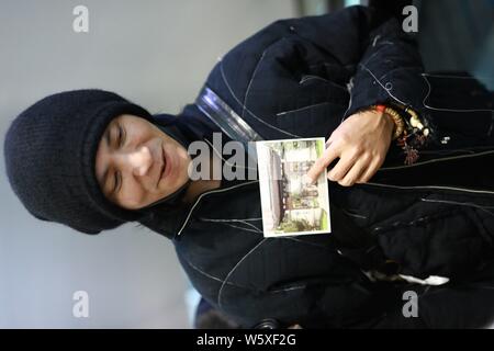 Chinese actor and singer Aloys Chen Kun leaves the Shanghai Hongqiao International Airport as he is absent from the Italian fashion brand Dolce and Ga Stock Photo