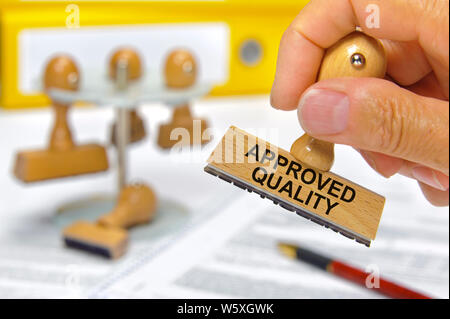approved quality  printed on rubber stamp Stock Photo
