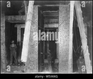Roosevelt Dam. Upstream side of sluice gates. (Flashlight).; Scope and content:  Photograph from Volume One of a series of photo albums documenting the construction of Roosevelt Dam, Stewart Dam, and other related work on the Salt River Project in Arizona. Stock Photo