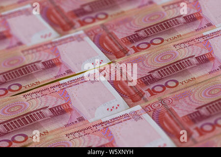 100 Chinese Renminbi banknotes background. China, Beijing. Stock Photo